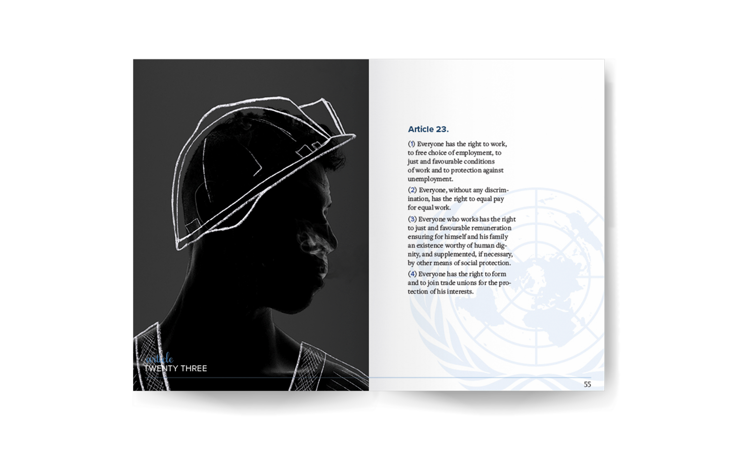 A book spread showing a man with a drawn on safety helmet and the text of the 23rd article of the UDHR.