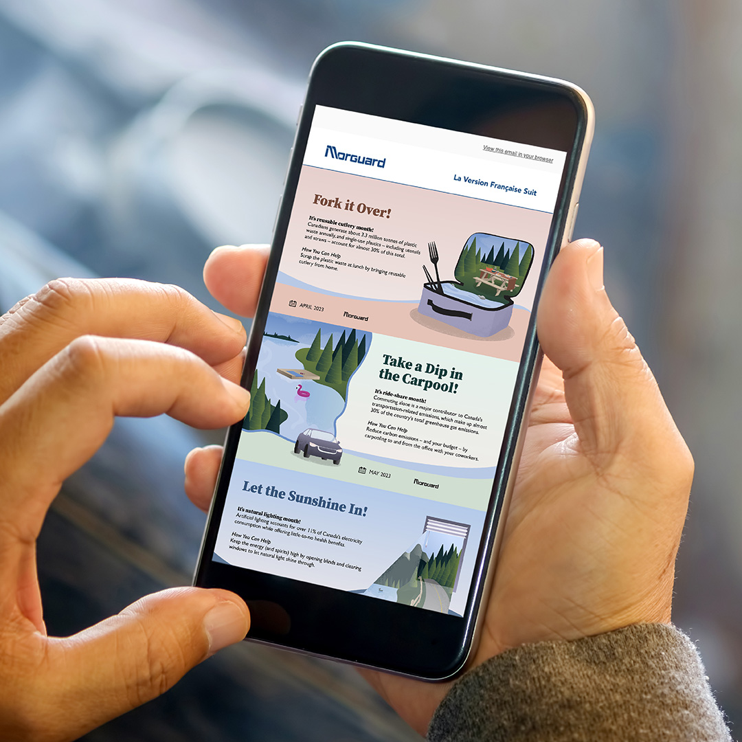 Hands holding a mobile phone showing three illustrated e-blasts.
